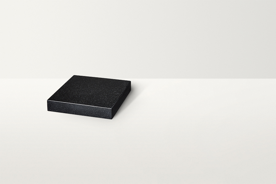 Co-op’s catalogue photograph of a plain, flat black granite plaque before inscription